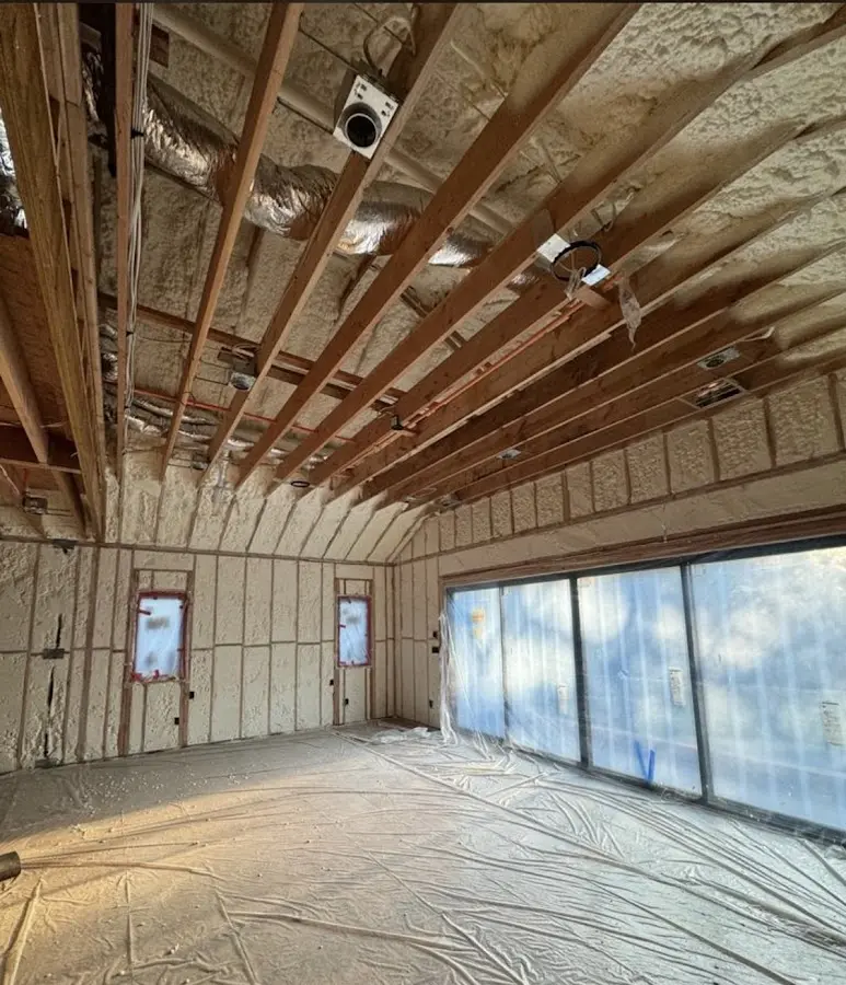 Interior walls and ceiling insulated with spray foam during new construction in South Jordan